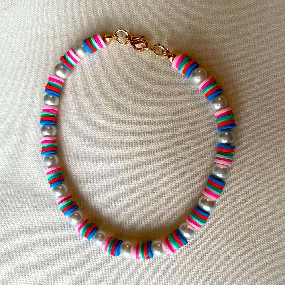 Adjustable multi colored anklet.
